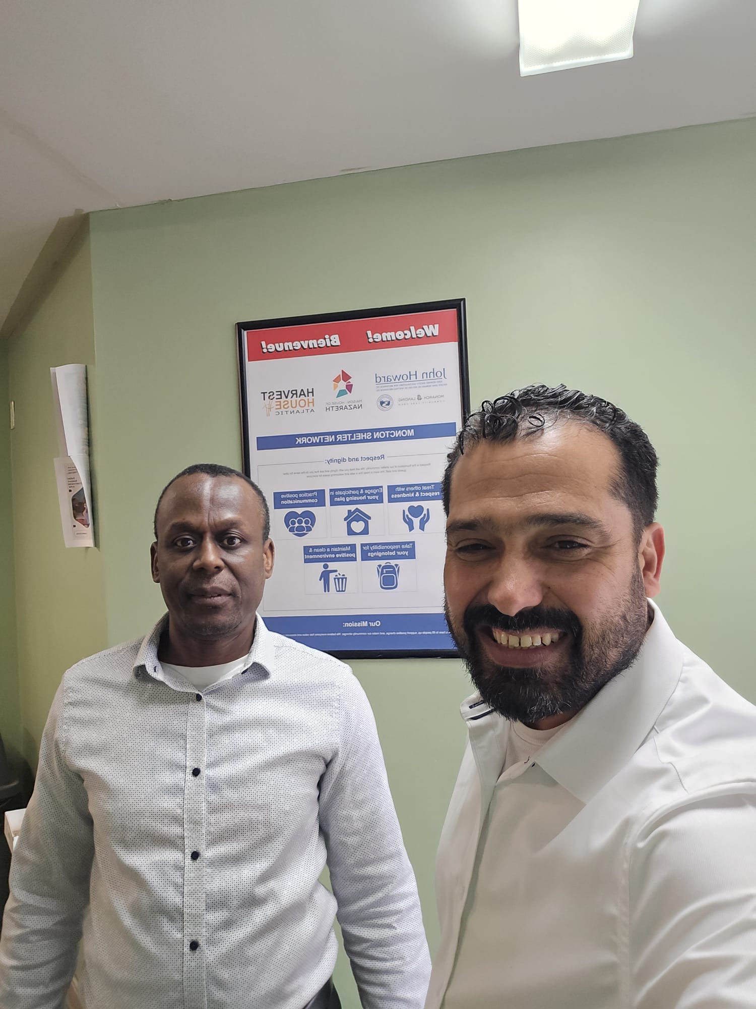 Ali Ettarnichi at House of Nazareth Shelter Moncton with Executive Director Pierre Francois