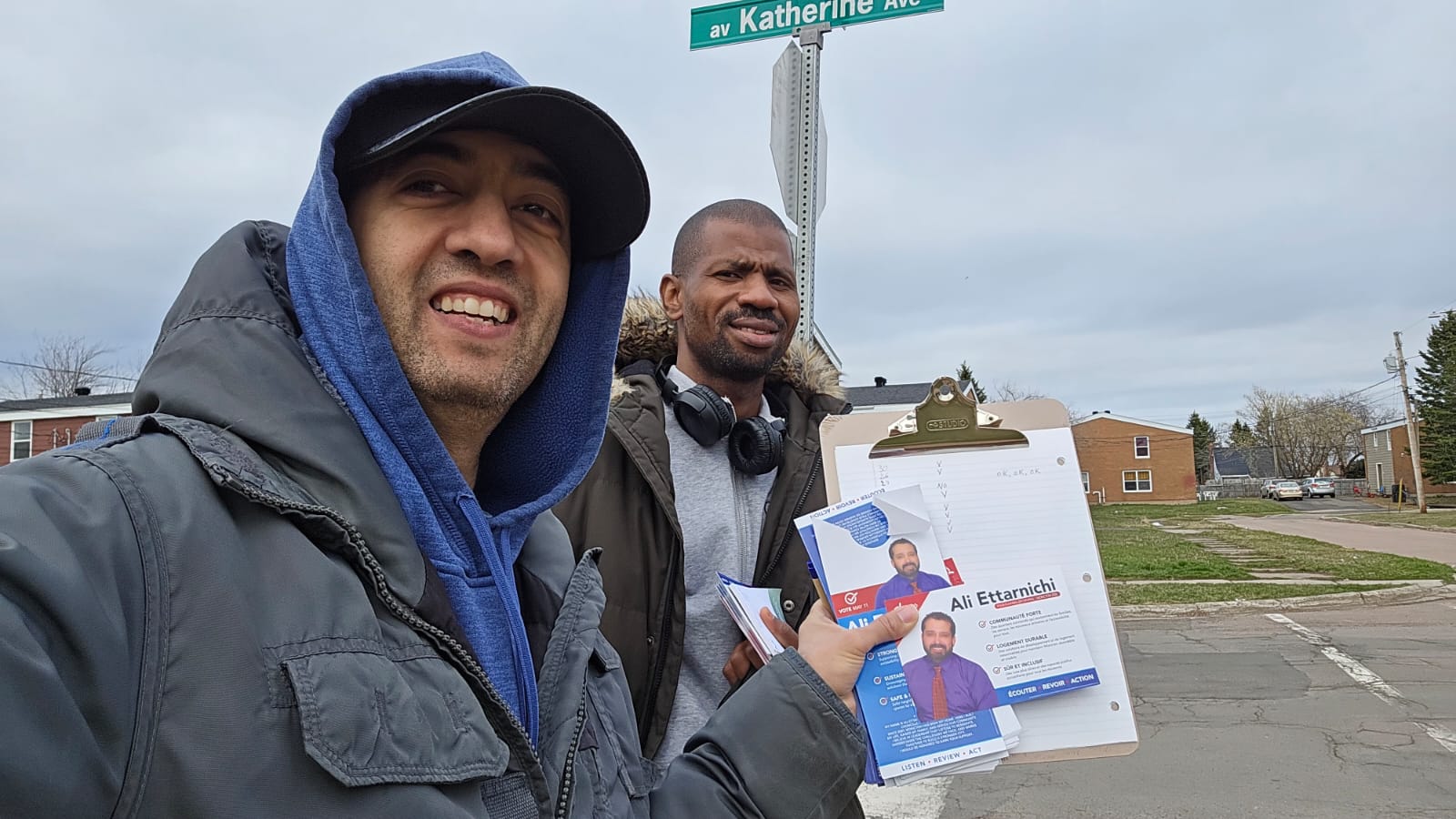 Ali Ettarnichi 2026 campaign volunteers knocking doors in Moncton